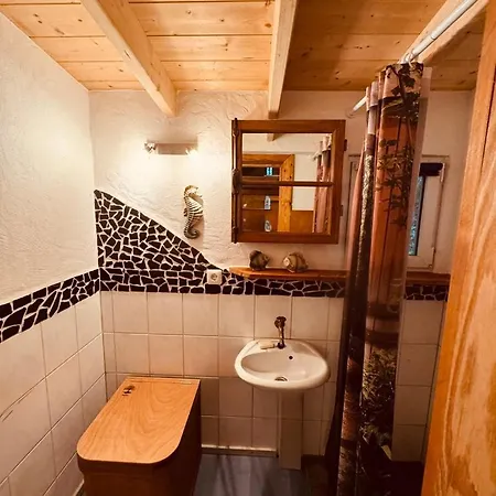 Hood In Wood Apartment Bermel